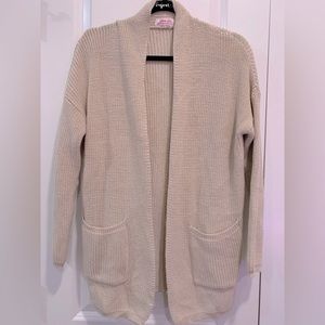 S/M light tan knit cardigan with pockets on front
